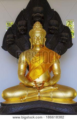 Golden Buddha statue at Khemarat DistrictUbon Ratchathani Province Thailand