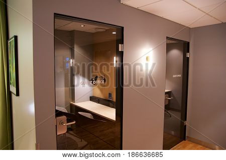 OSLO, NORWAY - JAN 21st, 2017: airport business class lounge interior of SAS, private working room or office with a desk in a frequent flyer lounge for SAS Gold customers.