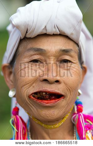 MAE KLANG LUANG, THAILAND - FEBRUARY 18, 2017 : A local Karen hilltribe woman is chewing betel plant in the Mae Klang Luang village near Chiang Mai, Thailand