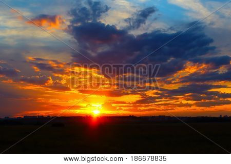 Beautiful summer sunset over a provincial town. Shooting from out of town