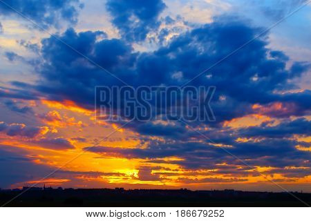 Beautiful summer sunset over a provincial town. Shooting from out of town