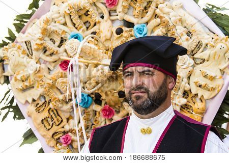 CAGLIARI, ITALY - MAY 1, 2017: 361 Religious procession of Sant'Efisio - portrait of a man in traditional Sardinian costume - Sardinia