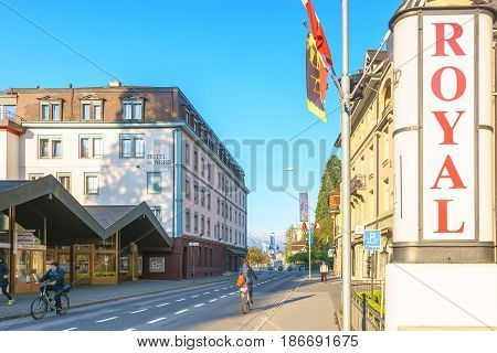 Interlaken Switzerland - April 29 2017: Hoheweg Street in the morning with people and blue sky at Interlaken Switzerland.