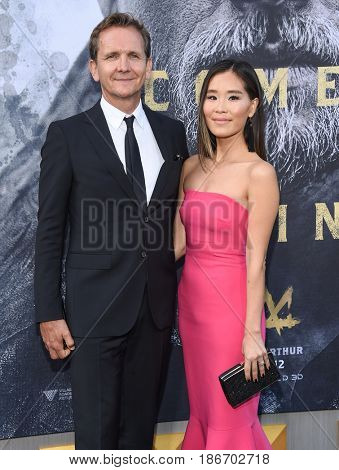 LOS ANGELES - MAY 08:  Sebastian Roche and Alicia Hannah arrives for the 'King Arthur: Legend Of The Sword