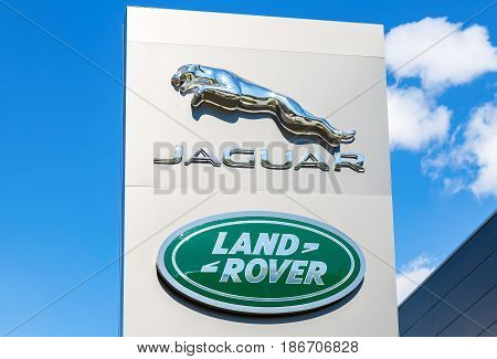 Samara Russia - May 13 2017: Jaguar Land Rover automobile dealership sign. Jaguar is a brand of the British car manufacturer Jaguar Land Rover