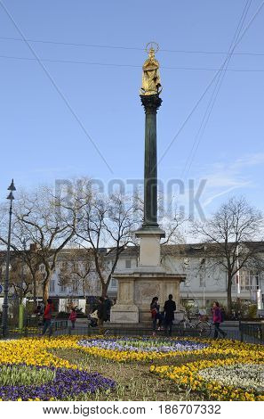 GRAZ, AUSTRIA - MARCH 19, 2017: Column with statue of the Virgin Maria at the square 
