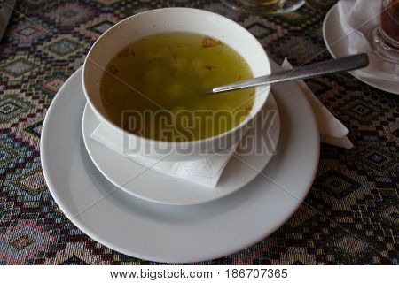 Azerbaijani national cuisine in white dish soup dushbara