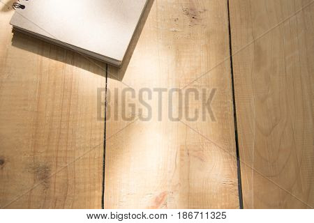 Book of brown on wooden table. top view angle