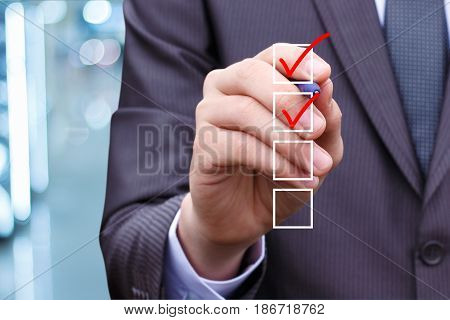 Businessman Hand Checking The Checking Box .