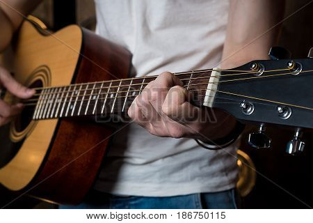 Playing Guitar. Acoustic Guitar In The Hands Of The Guitarist. Horizontal Frame