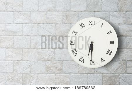 Closeup white clock for decorate show half past six or 6:30 a.m. on old brick wall textured background with copy space in interior concept