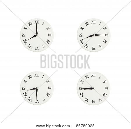 Closeup group of white clock with shadow for decorate show the time in 8 8:15 8:30 8:45 a.m. isolated on white background beautiful 4 wall clock picture in different time