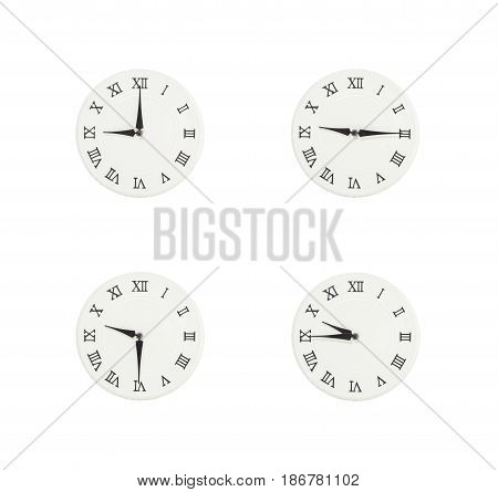 Closeup group of white clock with shadow for decorate show the time in 9 9:15 9:30 9:45 a.m. isolated on white background beautiful 4 wall clock picture in different time