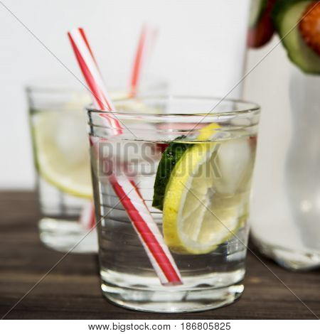 Water with fresh lemon strawberries and cucumber
