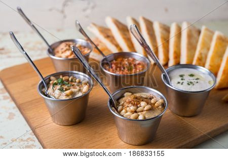 Set Of Appetizers: Hummus, Muhammara, Tirokafteri, Greek Cacik