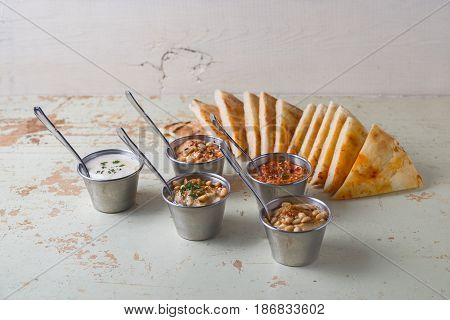 Set Of Appetizers: Hummus, Muhammara, Tirokafteri, Greek Cacik