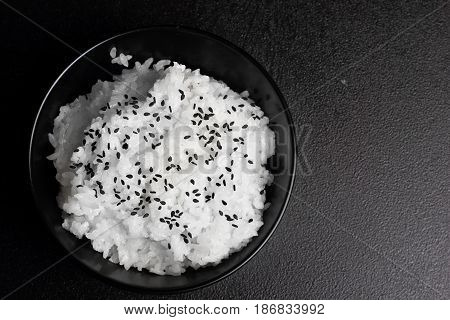 Rice. Plater With Rice Black Sesame Over Stone Table.copy Space