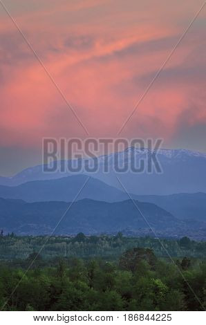 Beautiful sun spots in Caucasus mountains. 3 Layers of mountains. Georgia.