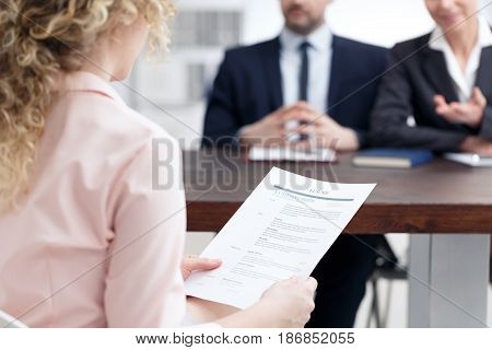 Woman Holding Her Resume