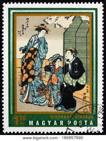 HUNGARY - CIRCA 1971: a stamp printed in Hungary shows Courtesans Painting by Kiyonaga Japanese Art circa 1971