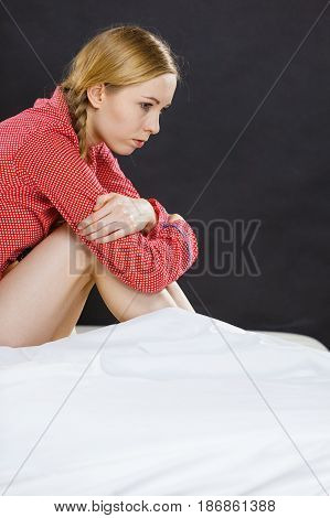 Sad Depressed Young Woman In Bed