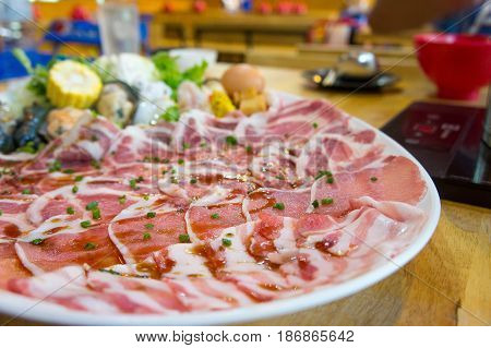 Vegetable and meat slides set in food shop
