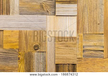 Fragment of mosaik panel from different grunge vintage wooden textures
