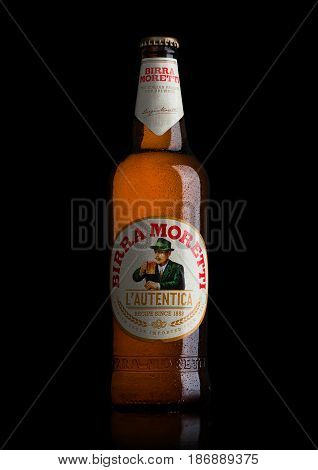 London, Uk - May 15, 2017: Bottle Of Birra Moretti Beer On Black, Italian Brewing Company, Founded I