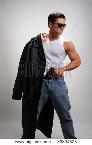 The secret agent is showing off his hot body.