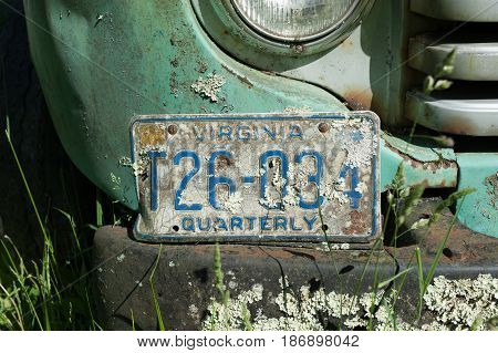 HOT SPRINGS VIRGINIA- MAY 8 2017: Old pick up truck abandoned by the side of the road.