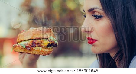 Happy Young Woman Eat Tasty Fast Food Burger
