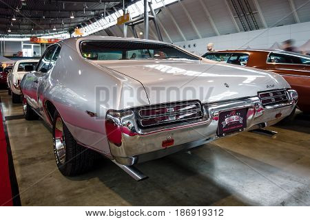 STUTTGART GERMANY - MARCH 03 2017: Muscle car Pontiac GTO 1969. Rear view. Europe's greatest classic car exhibition 