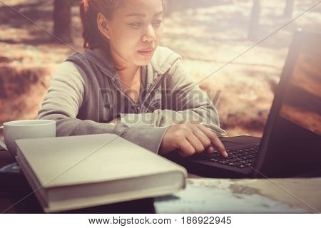 Hands on working women In the nature park on vacation