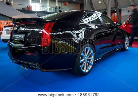 STUTTGART GERMANY - MARCH 03 2017: Entry-level luxury car Cadillac ATS-V 2016. Rear view. Europe's greatest classic car exhibition 