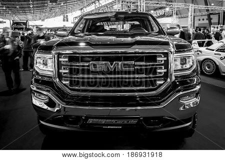 STUTTGART GERMANY - MARCH 03 2017: Heavy-Duty pickup truck GMC Sierra 1500 Crew Cab SLT 2017. Black and white. Europe's greatest classic car exhibition 