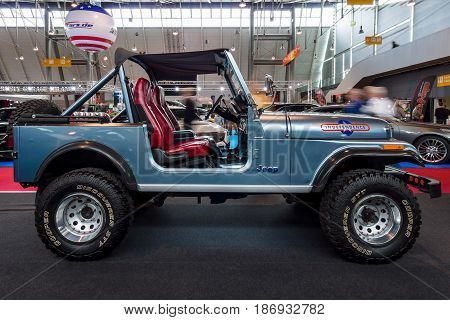 STUTTGART GERMANY - MARCH 03 2017: Compact sport utility vehicle Jeep CJ7 1980. Europe's greatest classic car exhibition 