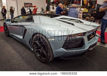 STUTTGART GERMANY - MARCH 03 2017: Sports car Lamborghini Aventador LP 700-4 2014. Rear view. Europe's greatest classic car exhibition "RETRO CLASSICS"