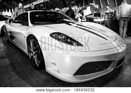 STUTTGART GERMANY - MARCH 03 2017: Sports car Ferrari F430 Scuderia 2008. Black and white. Europe's greatest classic car exhibition 