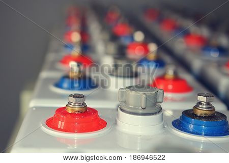 Accumulator battery of electric direct current industrial charging of cars and devices. accumulator battery of the electric power direct current DC is a large blast. Contacts plus and minus battery