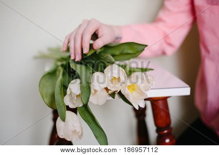 Girl holding tulips. Beauty, pink and tenderness