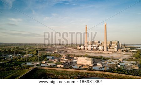 An aerial view of the decommissioned Tilbury A and B fossil fuel power stations located on the banks of the River Thames in Essex England.