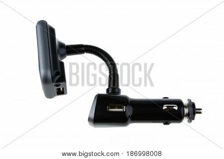 Mp3 Fm transmitter with remote control isolated on white background. It plays mp3, you listen on fm channel on car radio.