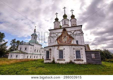 Old Orthodox Church At Village. Summer View With Floral Meadow.