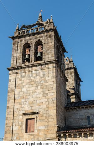 Braga, Portugal - Circa February 2019: Braga Cathedral With Its Gothic Bell Towers. Se De Braga Is T
