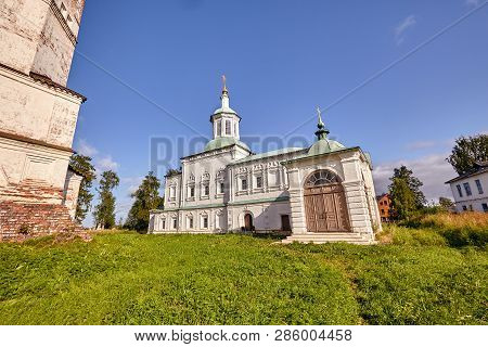 Old Orthodox Church At Village. Summer View With Floral Meadow.