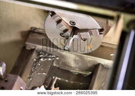 Spindle Chuck And Installed Metal Part On High Precision Cnc Industrial Lathe Turning Machine. Close