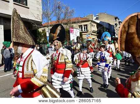 Verin, Spain, 24 Feb 2019. Famous Carnival And Street Parade With Cigarrons Costumes. Ourense Provin