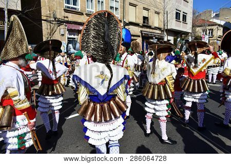 Verin, Spain, 24 Feb 2019. Famous Carnival And Street Parade With Cigarrons Costumes. Ourense Provin