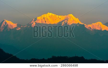 A View Of Snow Clad Kangchenjunga, Also Spelled Kanchenjunga, Is The Third Highest Mountain In The W