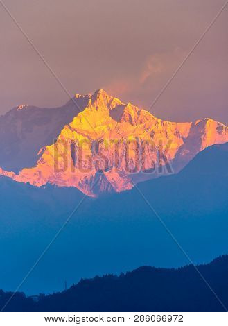 A view of Snow clad Kangchenjunga, also spelled Kanchenjunga, is the third highest mountain in the w